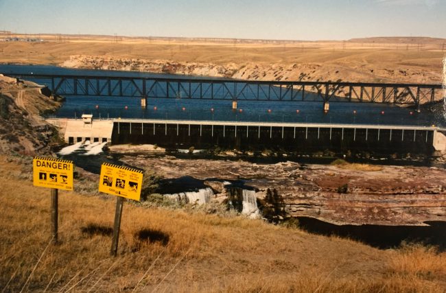 Civilization’s imprint defines the Lewis and Clark trail today. The Missouri River’s Rainbow Falls (above), which Lewis described as “one of the most beautiful objects of nature” where “water dashing against the rocky bottom rises into foaming billows and glides away hissing, flashing and sparkling,” is today reduced by a hydroelectric power plant to a managed trickle of its former self. (© FlaglerLive)