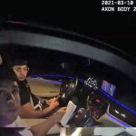 Seen here in a still from a sheriff's deputy's body cam video, the man in the passenger seat is sought by law enforcement after evading deputies during a traffic stop on I-95 early this morning. His identity is unknown, beyond a first name of "Derreck."