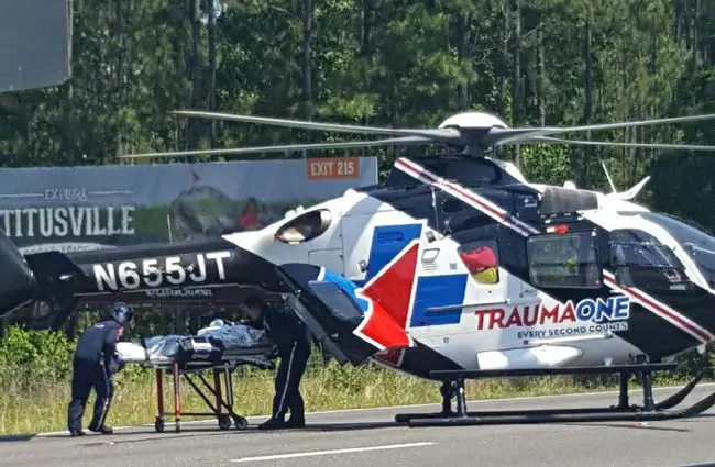 Three emergency helicopters responded to the scene at I-95's Mile Marker 295, near the Matanzas Parkways interchange, after the 2 p.m. wreck. (c Joshua Counts for FlaglerLive)