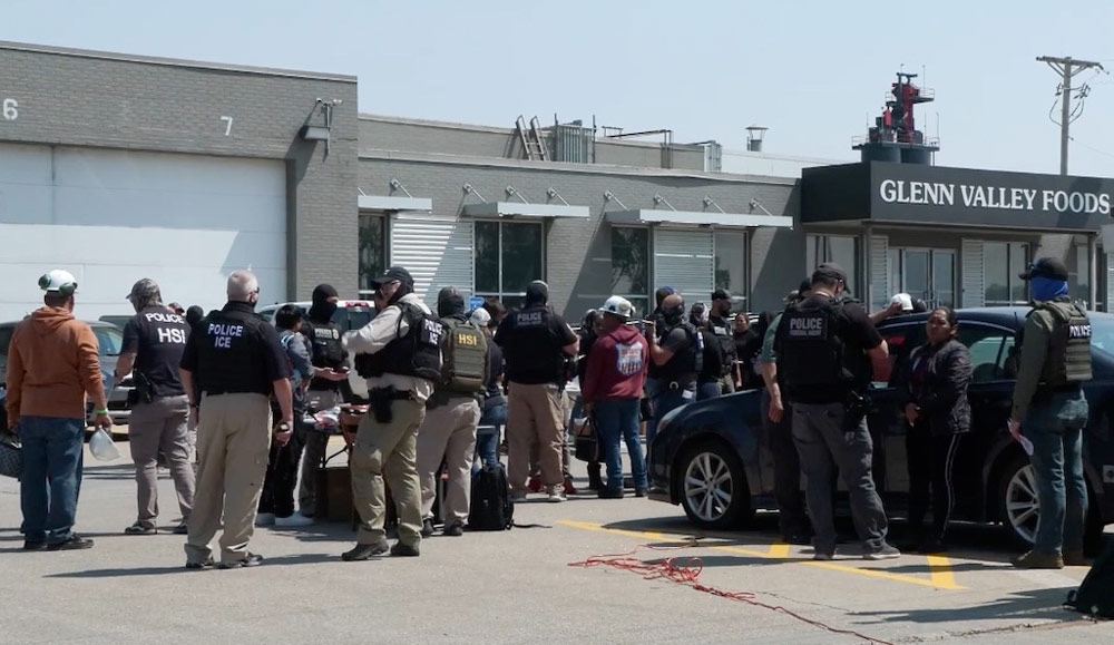 Federal immigration agents converge on Glenn Valley Foods in Omaha, Neb., on June 10 for an immigration raid. A new analysis released Thursday estimates mass deportations could cost more than 6 million jobs, a figure that includes both immigrants and U.S.-born workers. (Photo courtesy of U.S. Immigration and Customs Enforcement via Nebraska Examiner)