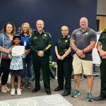 Sheriff Staly and Deputy Erlandson presented Karter Consolazio with a certificate for a scholarship to attend the FCSO Crime Scene Investigation (CSI) Academy this summer. (FCSO)