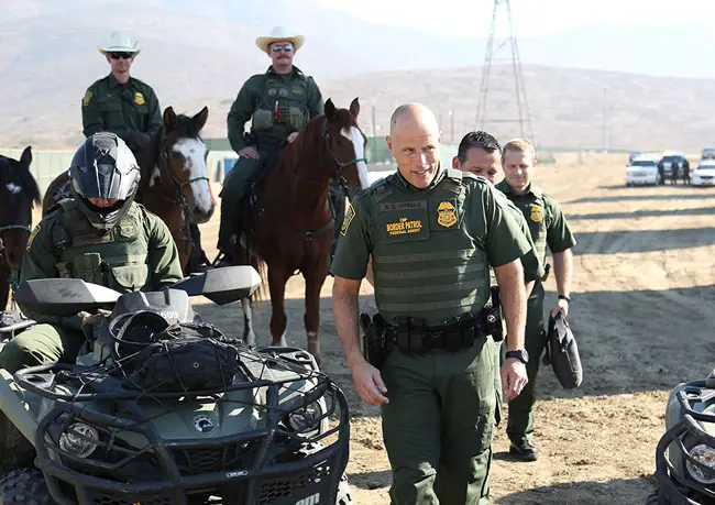 The featured image under 'Immigration' at the White House website has nothing to do with what made America great--its immigrants--but with the heavily armed policing of the border.