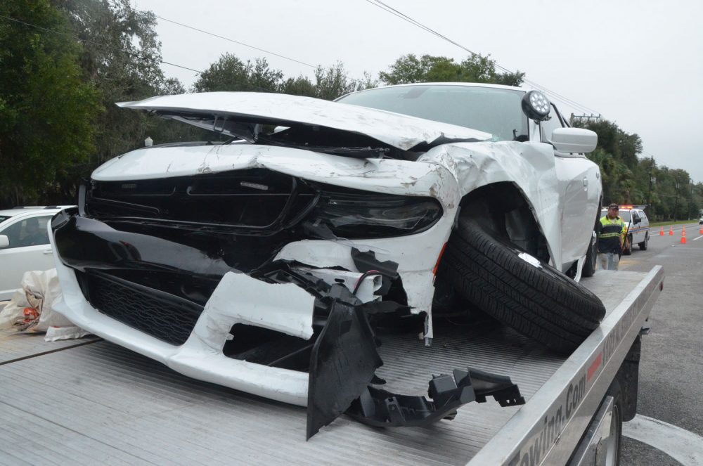 Flagler County Sheriff's Deputy Kyle Gaddie's new Dodge Charger was likely totaled in the wreck today off 16th Road in the Hammock. (© FlaglerLive)