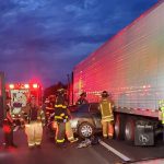 The three occupants of the Lincoln Town Car escaped with only minor injuries in a crash with a semi on I-95 Friday evening. (FCSO)