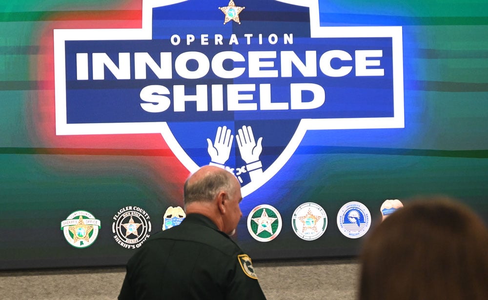 Sheriff Rick Staly preparing to address the press on June 23 on a regional operation against sexual exploitation. (© FlaglerLive)