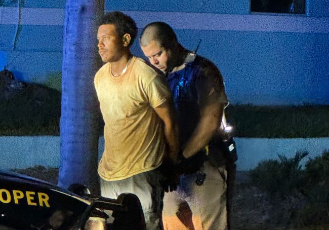 Isaiah Warren as he was arrested by a Florida Highway Patrol trooper. (© FlaglerLive)