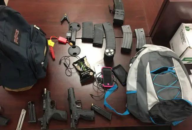 Some of the weapons, ammunition and other items recovered from a garage theft on Postman Lane in Palm Coast. (FCSO)
