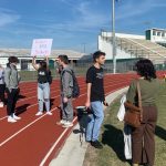 Jack Petocz, near the center with a bullhorn, was one of several students suspended at Flagler Palm Coast High School and Matanzas High School for different reasons following Thursday's walkout protesting lawmakers' "Don't Say Gay" bill. As of this afternoon, Petocz said he still didn't know how long his suspension was to be.