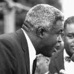 Jackie Robinson addresses civil rights supporters protesting outside the 1964 GOP National Convention.