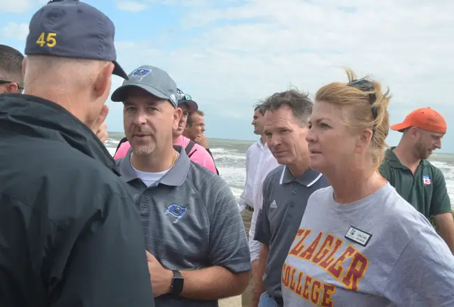 Jacob Oliva, center, speaking with Gov. Rick Scott in Flagler Beach in October. Vernon Orndorff, right of Oliva, has been Oliva's deputy and is his likely successor. School Board member Colleen Conklin is to the right. (c FlaglerLive)