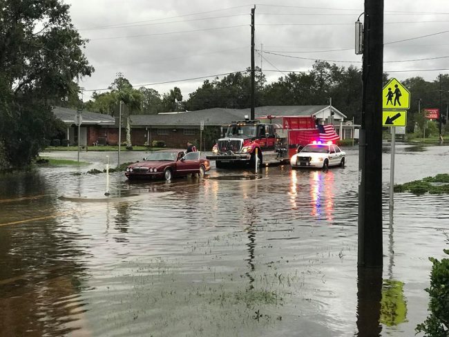 What not to do just yet: a motorist this morning on East Moody Boulevard was using up responders' assistance, which is needed elsewhere. (c Jon Hardison/FlaglerLive)