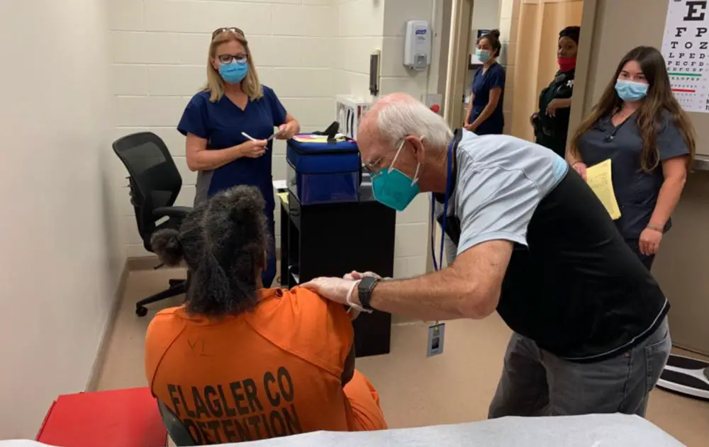 An inmate getting his second Moderna covid vaccine at the Flagler County jail today. (FCSO)