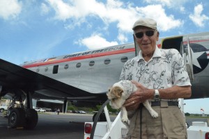 James Kade, 91, a former Luftwaffe airman, with his dog Jackie just before going aboard the Spirit of Freedom. Click on the image for larger view. (© FlaglerLive)