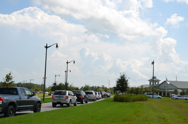 Jamming at Imagine: the car lines in Town Center stretched roughly a mile between the two directions, bringing traffic to a near-standstill Monday afternoon.  (© FlaglerLive)