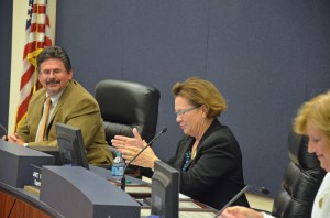 'I’m very proud to be superintendent of Flagler County schools right now,' Janet Valentine said. She is flanked by board members  Andy Dance and Sue Dickinson. Click on the image for larger view. (© FlaglerLive)