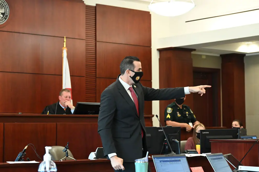 "This defendant did the unspeakable, ladies and gentlemen. He fled from the scene," Assistant State Attorney tells the jury as he points to Joshua Carver, the Palatka man on trial in Bunnell over the hit-and-run death of John Rogers in 2020. Carver faces up to 30 years in prison if convicted. (© FlaglerLive)