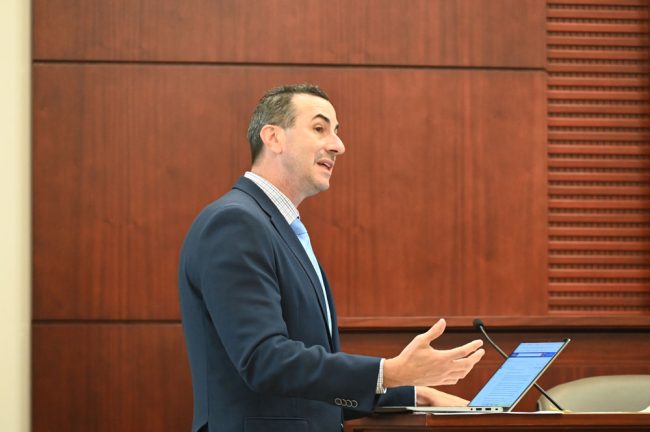 Assistant State Attorney Jason Lewis runs the numbers. (© FlaglerLive)