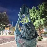 Jeff Whipple's "The Reader" (concrete and paint), at 123 South Adams Street in Tallahassee. (© FlaglerLive)