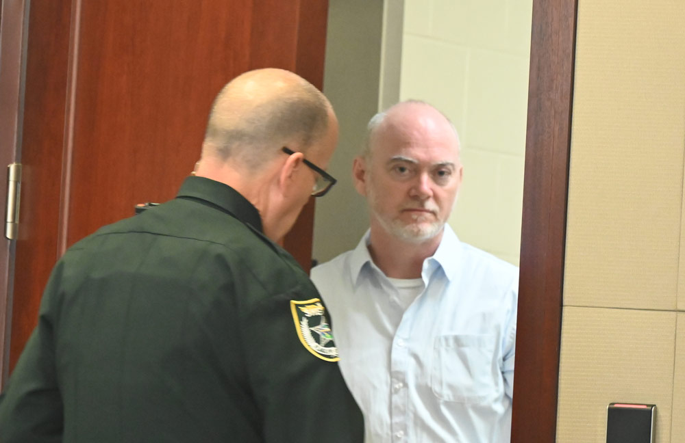 Michael Jennelle arriving for court today. He's been held at the Flagler County jail on $100,000 bond since June 2023. (© FlaglerLive)