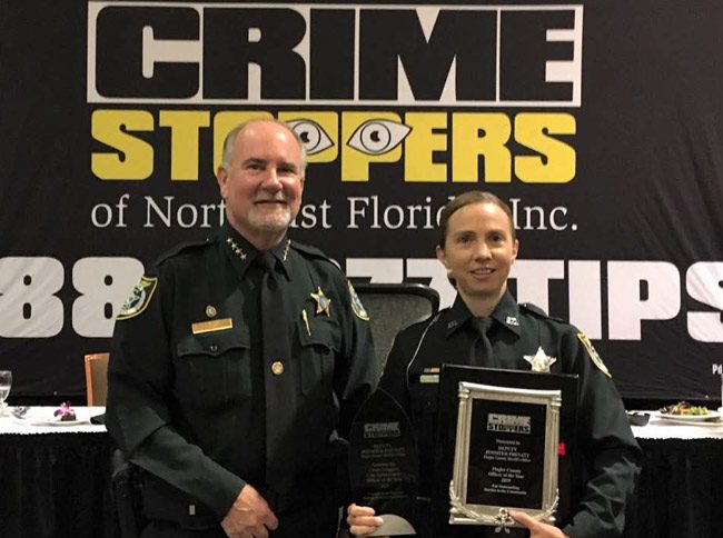 Flagler Sheriff's deputy Jennifer Prevatt with Sheriff Rick Staly. (FCSO)