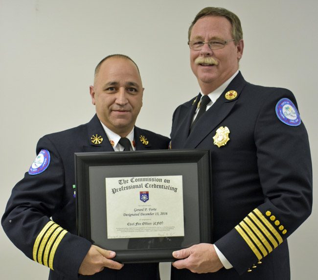 They're all stripes: Deputy Fire Chief Jerry Forte, left, and Chief Mike Beadle. (Palm Coast)