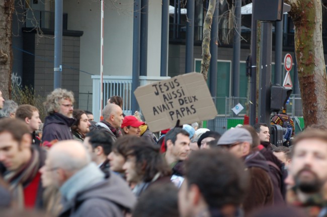 'Jesus too had two daddies,' reads the sign of a French supporter of gay marriage and adoptions. (Waldopics)