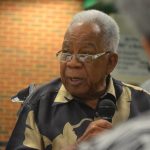 Jim Guines in 2015. Laverne Guines is in the foreground. Jacob Oliva, the former Flagler superintendent and currently the secretary of education in Arkansas, is in the background. (© FlaglerLive)