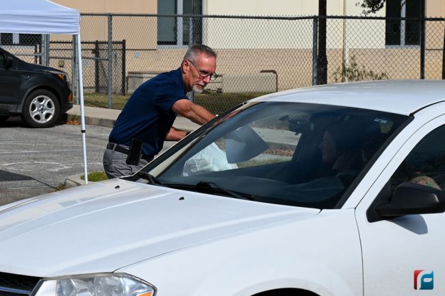 Superintendent Jim Tager distributing meals earlier today at Buddy Taylor Middle School. (Flagler Schools)