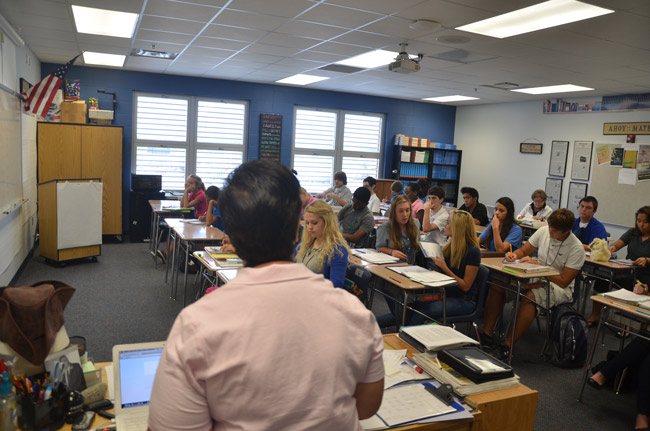 Where she'd rather be: the author, in her classroom at Matanzas High School, the day before she took a three-month leave for cancer treatment. She goes into surgery on Tuesday, Nov. 13. (© FlaglerLive)