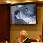 Keith Johansen threatening his wife in a video clip shown the jury during the 2021 trial, days before he murdered her. Johansen was to the right in the courtroom, masked, next to his attorney, Gary Wood. (© FlaglerLive)