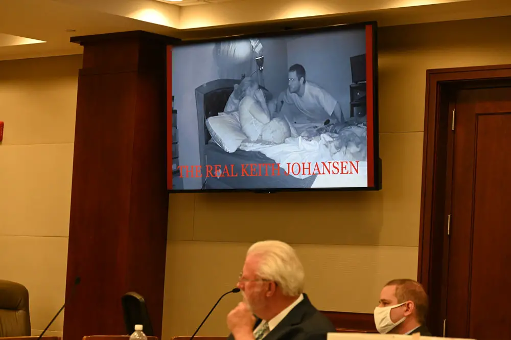 Keith Johansen, right, with his attorney, Garry Wood, as Assistant State Attorney Jennifer Dunton (out of the frame) was presenting closing arguments to the jury, portraying what she described as "the real Keith Johansen." One of the many video clips shown the jury was a replay of Johansen threatening his wife Brandi Celenza the night of April 5, 2018, 36 hours before he shot her twice, killing her. (© FlaglerLive)