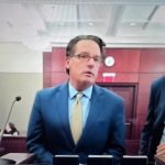 John Cacone, center, with his attorney John Hager, appearing before Circuit Judge Dawn Nichols on Tuesday in Bunnell. (© FlaglerLive via zoom)