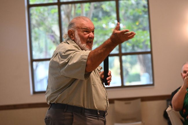 Fifteen years leading City Repertory Theatre hasn't aged him a day: the oracular John Sbordone addressing the audience at FC3's annual meeting. (© FlaglerLive)