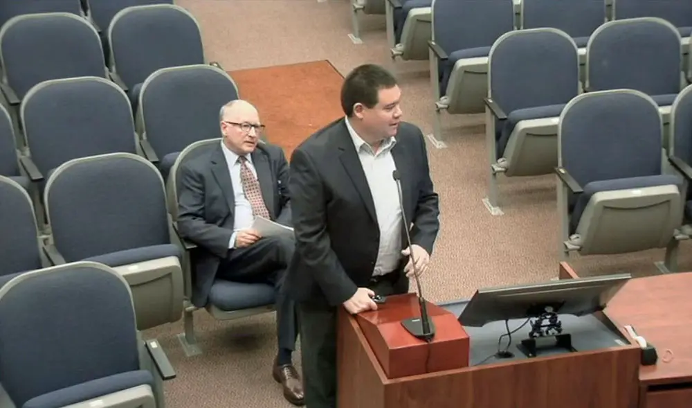 Flagler Emergency Chief Jonathan Lord, in the foreground, spoke to the County Commission this morning about the coronavirus and local measures, along with Bob Snyder, head of the Flagler County Health Department. 