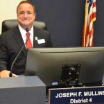 Joe Mullins when he was first seated as a Flagler County Commissioner in 2018. (© FlaglerLive)