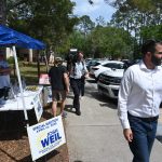 Josh Weil campaigning in Palm Coast on the last day of the special election for a congressional seat last April 1, which he lost to Randy Fine. (© FlaglerLive)