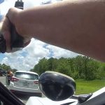 Danielle, 15, emerges from the car that had been stolen from a Cooper Lane driveway around midday Wednesday in a still from body camera footage released by the Sheriff's Office.