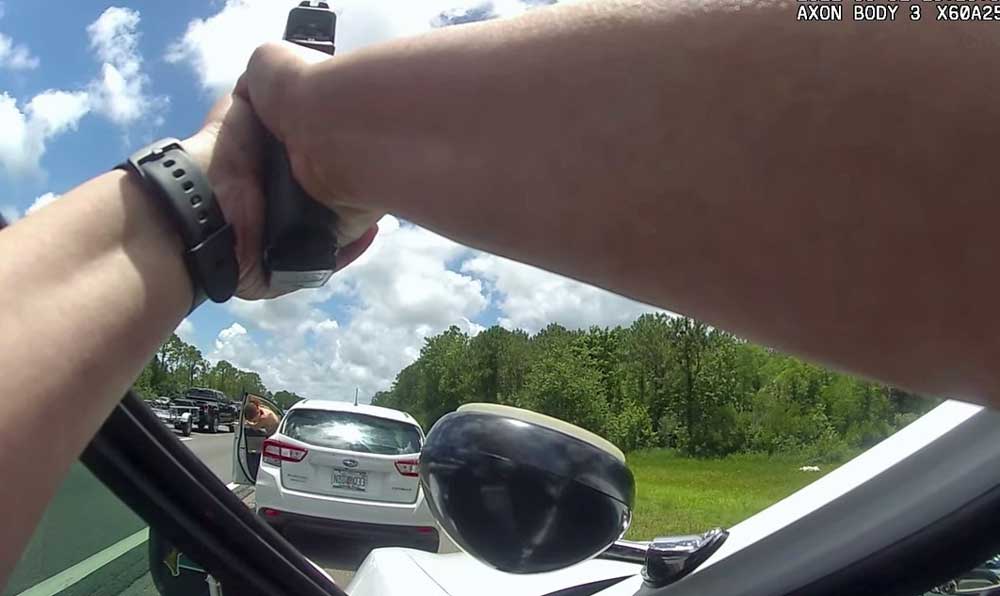 Danielle, 15, emerges from the car that had been stolen from a Cooper Lane driveway around midday Wednesday in a still from body camera footage released by the Sheriff's Office. 