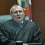 Judge Wayne Culver telling a man in the courtroom to "shut up," before becoming more crass and threatening the man with jail, on Feb. 10, 2022.