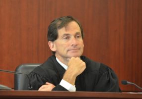 Circuit Judge Dennis Craig leaves his second tenure as a judge in Flagler to start his second tenure as a judge in Volusia. (© FlaglerLive)
