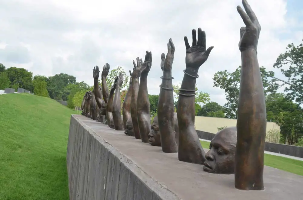 “Raise Up,” the sculpture by Hank Willis Thomas, at the National Memorial for Peace and Justice in Montgomery, Ala. (© FlaglerLive)