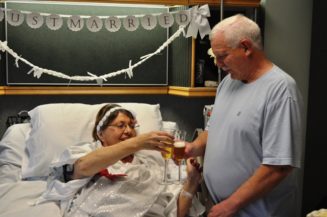 Julia Roberts and Terry Adolph drink up to their wedding vows, 17 years into their courtship, at Florida Hospital Flagler. (FHF)