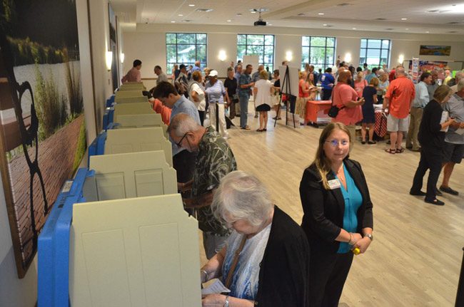 Supervisor of Elections Kaiti Lenhart at a candidate hobnob organized by the Chamber of Commerce last month, where a straw poll was also conducted. (© FlaglerLive)