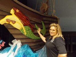 Kelly Rivera, drama teacher at Flagler Palm Coast High School and the director and musical director of 'The Little Mermaid.' With musicals, she says, 'go big or go home.' Click on the image for larger view. (© FlaglerLive)