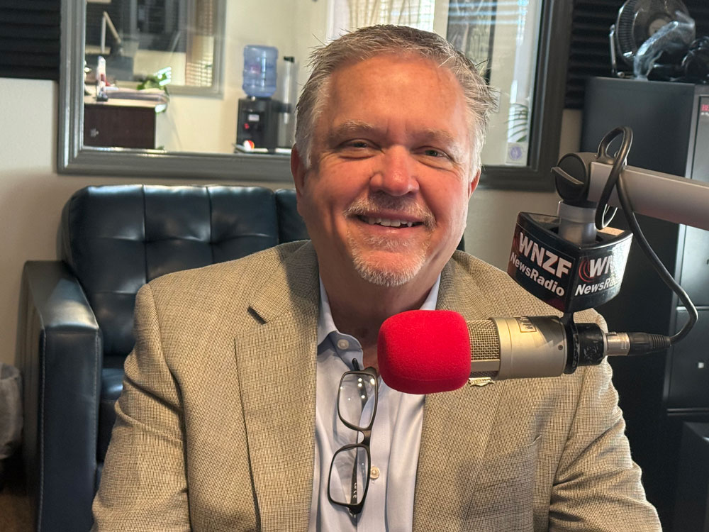 Ken Belshe of SunBelt Land Management, the developer of Summertown and Veranda Bay, on WNZF last week. (© David Ayres for FlaglerLive)