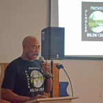 Ken Bryan, addressing the audience at the November 7 meeting on The Gardens. Bryan is the target of a defamation lawsuit by The Gardens' umbrella company, SunBelt Land Management. (© FlaglerLive)