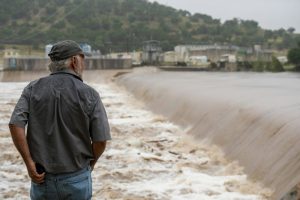A Kerrville, Texas, resident watches the flooded Guadalupe River on July 4, 2025