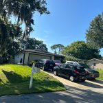 The house at 20 Blare Drive last week, a few days after the murder of a 36-year-old man by gunshot there, and a few days before today's alarm over the find of a crate of grenades inside. (© FlaglerLive)