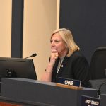 Flagler County Commissioner Kim Carney at Thursday evening's hearing. (© FlaglerLive)