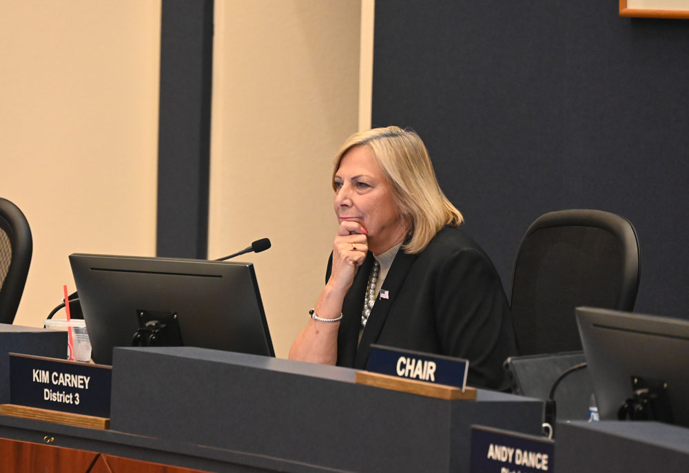 Flagler County Commissioner Kim Carney at Thursday evening's hearing. (© FlaglerLive)